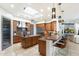 Spacious kitchen featuring an island, granite countertops, and modern stainless steel appliances at 15802 N 71St St # 754, Scottsdale, AZ 85254