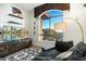 Inviting living room with modern media center and city views at 15802 N 71St St # 754, Scottsdale, AZ 85254