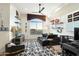 Inviting living room with modern media center and city views at 15802 N 71St St # 754, Scottsdale, AZ 85254