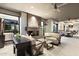 Spacious living room features a modern fireplace, lots of light, and an inviting atmosphere at 15802 N 71St St # 754, Scottsdale, AZ 85254