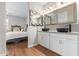Bathroom featuring double vanity with vessel sinks and view of the bedroom at 16658 W Mescal St, Surprise, AZ 85388