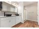 Bathroom featuring double vanity with vessel sinks and a glass-enclosed shower at 16658 W Mescal St, Surprise, AZ 85388