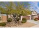 Beautiful two-story home with desert landscaping, a two-car garage, and a well-maintained front yard at 16658 W Mescal St, Surprise, AZ 85388