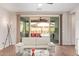 Bright living room with sliding glass doors leading to a patio with backyard views at 16658 W Mescal St, Surprise, AZ 85388