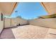 Private brick-paved backyard with stucco walls, perfect for outdoor entertaining and relaxation at 17022 N Pinion Ln, Sun City, AZ 85373