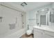 Bathroom with a shower/tub, toilet, vanity, and light-colored hard surface floors at 17022 N Pinion Ln, Sun City, AZ 85373