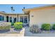 Charming single-story home with desert landscaping and a welcoming walkway to the front door at 17022 N Pinion Ln, Sun City, AZ 85373