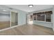 Enclosed patio with sliding glass doors and light blue wood paneled walls at 17022 N Pinion Ln, Sun City, AZ 85373