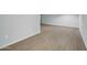 Spacious living room with wood floors and neutral walls, offering a versatile living space at 17022 N Pinion Ln, Sun City, AZ 85373