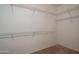 Walk-in closet with wire shelving system at 19212 N Tallowood Way, Surprise, AZ 85387