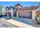 Charming townhome showcasing low-maintenance landscaping and attached two-car garage at 19700 N 76Th St # 2148, Scottsdale, AZ 85255