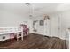bedroom with a bunk bed, playhouse, and dark laminate flooring at 2046 E Avenida Del Sol --, Phoenix, AZ 85024