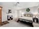 Cozy bedroom featuring neutral walls, ceiling fan, and comfortable furnishings at 2046 E Avenida Del Sol --, Phoenix, AZ 85024