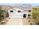 Stunning home with a well-manicured yard and solar panels for energy efficiency, set against a picturesque mountain backdrop at 2046 E Avenida Del Sol --, Phoenix, AZ 85024