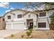 Beautiful two-story home with a three-car garage and desert landscaping at 2046 E Avenida Del Sol --, Phoenix, AZ 85024