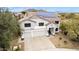 This inviting home showcases solar panels and a well-maintained front yard, combining curb appeal with modern efficiency at 2046 E Avenida Del Sol --, Phoenix, AZ 85024