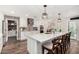 Stylish kitchen with a spacious island, stainless steel appliances, and modern white cabinetry at 2046 E Avenida Del Sol --, Phoenix, AZ 85024