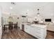Open-concept kitchen with an island, stainless steel appliances, dining area and cozy living space at 2046 E Avenida Del Sol --, Phoenix, AZ 85024