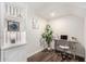 Charming office space with built-in shelving, wood floors and a wooden desk under a vaulted ceiling at 2046 E Avenida Del Sol --, Phoenix, AZ 85024