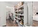 Well-organized pantry with ample shelving, offering plenty of storage and easy access at 2046 E Avenida Del Sol --, Phoenix, AZ 85024