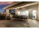 Covered patio featuring an outdoor dining set with a ceiling fan and built-in barbecue at 2046 E Avenida Del Sol --, Phoenix, AZ 85024