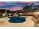 Backyard with a pool, patio, and lush desert landscaping at 2046 E Avenida Del Sol --, Phoenix, AZ 85024