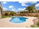 The serene pool is surrounded by lovely landscaping, offering a private retreat for relaxation and recreation at 2046 E Avenida Del Sol --, Phoenix, AZ 85024