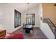 Bright dining room with a modern chandelier and window shutters for added privacy at 22043 N 59Th Dr, Glendale, AZ 85310