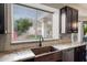 Close up of stainless steel appliances, granite countertops and sink area at 22043 N 59Th Dr, Glendale, AZ 85310