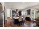 Modern kitchen boasts a center island, stainless appliances, and custom cabinetry at 22043 N 59Th Dr, Glendale, AZ 85310