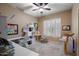 Bright home office space featuring built-in desks, storage, and a large window at 22043 N 59Th Dr, Glendale, AZ 85310