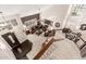 Open concept living room showcasing natural light, soaring ceiling, and inviting seating at 2218 E Mallard Ct, Gilbert, AZ 85234
