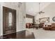 Inviting living room features high ceilings, a ceiling fan, and a gorgeous entryway at 2218 E Mallard Ct, Gilbert, AZ 85234