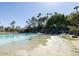 Beautiful community lagoon style pool with sandy beach at 2218 E Mallard Ct, Gilbert, AZ 85234