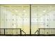 Well lit racquetball court featuring glass walls at 2218 E Mallard Ct, Gilbert, AZ 85234