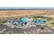 New construction community featuring a resort-style pool, clubhouse, playground, and ample parking at 2475 W Spaulding Ave, Apache Junction, AZ 85120