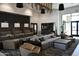 Inviting resident lobby featuring multiple seating areas, neutral tones, and designer lighting at 2475 W Spaulding Ave, Apache Junction, AZ 85120
