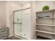 Modern shower with glass door and built in shelves at 2475 W Spaulding Ave, Apache Junction, AZ 85120