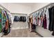 Large walk-in closet with ample storage and custom shelving at 2475 W Spaulding Ave, Apache Junction, AZ 85120