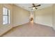 Bedroom showcasing tile flooring and a ceiling fan at 25767 N 67Th Dr, Peoria, AZ 85383