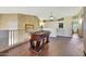 Upper level game room with vaulted ceilings, a ceiling fan, and a custom foosball table at 25767 N 67Th Dr, Peoria, AZ 85383