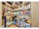 Organized pantry with wire shelving offering ample storage space for food and appliances at 25767 N 67Th Dr, Peoria, AZ 85383