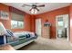 Bedroom with sports themed decorations and an en-suite bathroom at 27071 N 172Nd Ln, Surprise, AZ 85387