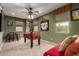 Fun game room with a foosball table, seating, and sports memorabilia at 27071 N 172Nd Ln, Surprise, AZ 85387