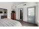 Bedroom with plank floors and vaulted ceilings at 2717 E Aster Dr, Phoenix, AZ 85032