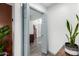 Hallway leading to rooms with hardwood floors at 2717 E Aster Dr, Phoenix, AZ 85032