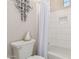 Bathroom featuring walk-in shower with neutral paint, and a decorative mirror at 28834 N 68Th Ave, Peoria, AZ 85383