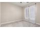 Bedroom with carpet flooring, neutral paint, closet, and window offering natural light at 28834 N 68Th Ave, Peoria, AZ 85383