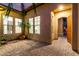 Private courtyard featuring brick pavers, desert landscaping, and entry into the home at 28834 N 68Th Ave, Peoria, AZ 85383