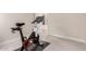 Exercise room featuring stationary bike, neutral paint, and carpet flooring at 28834 N 68Th Ave, Peoria, AZ 85383